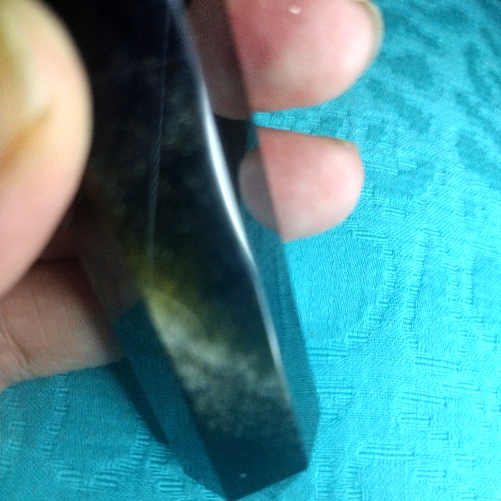 Black Obsidian Tower with Golden Hues